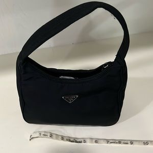 EUC Prada Re-vinyl mini bag. No marks or scuffs, barely used.